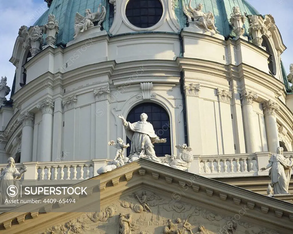 Austria. Vienna. Church of St. Charles (1716-1737). Statue of Saint Charles at the apex point of the pediment.