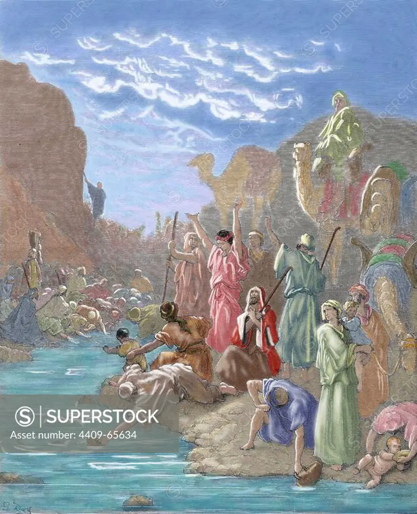 Moses brings forth water from the rock. Book of Exodus. G. Dore engraving. Colored.
