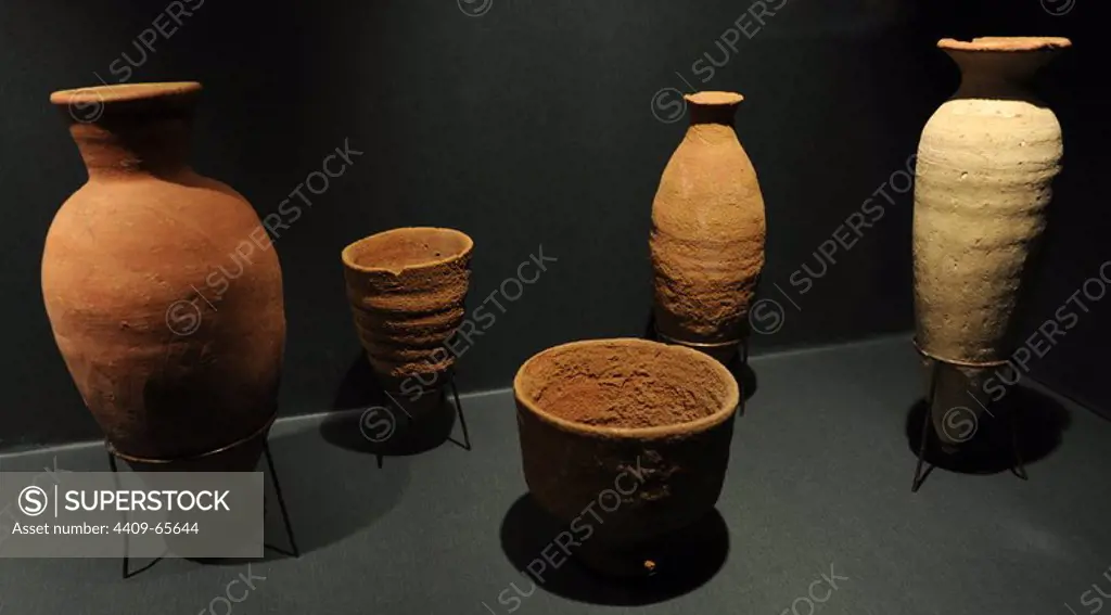Bottles and bowls in fired clay. First Intermediate Period. C. 2150-2050 BC. From a tomb of burial area from Sedment, Egypt. Ny Carlsberg Glyptotek Museum. Copenhagen. Denmark.