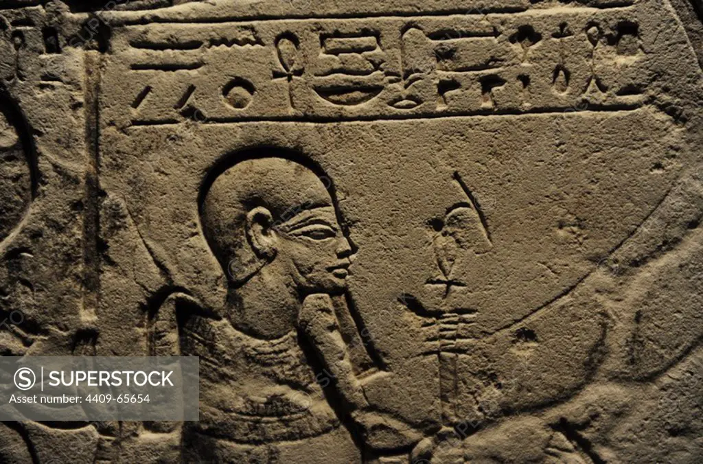 Offering stele for the god Ptah and his wife Sakhmet. Detail of Ptah. Limestone. 19th Dynasty. New Kingdom. 1305-1196 BC. Temple of Ptah. Memphis, Egypt. Ny Carlsberg Glyptotek Museum. Copenhagen. Denmark.