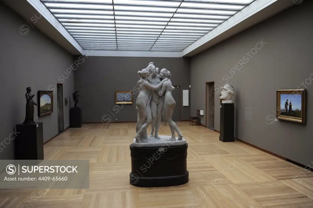Marble sculpture group of the Three Graces by the italian sculptor Antonio Canova (1757-1822). Ny Carlsberg Glyptotek. Denmark. Copenhagen.