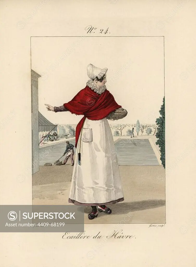 Oyster shucker of Le Havre. She wears a low bonnet decorated with lace only to the ears. A knife hangs from her belt, and she carries a basket of oysters. In the background, workers can be seen raking shells in oyster beds. Hand-colored fashion plate illustration by Lante engraved by Gatine from Louis-Marie Lante's "Costumes des femmes du Pays de Caux," 1827/1885. With their tall Alsation lace hats, the women of Caux and Normandy were famous for the elegance and style.