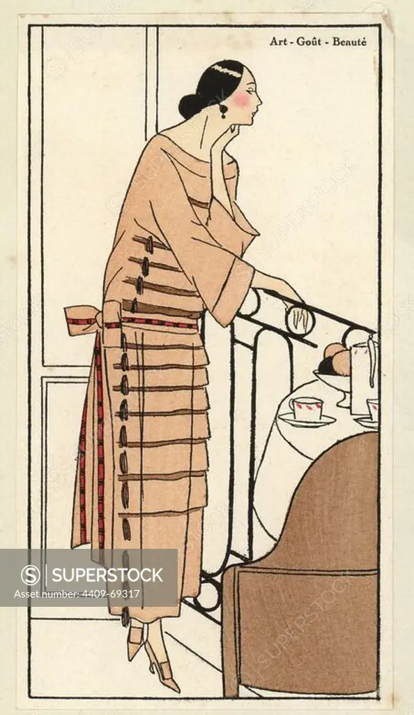Woman in tea dress of hazelnut silk chiffon decorated with Moroccan crepe flounces tied with silk buckles. Handcolored pochoir (stencil) lithograph from the French luxury fashion magazine "Art, Gout, Beaute" 1923.