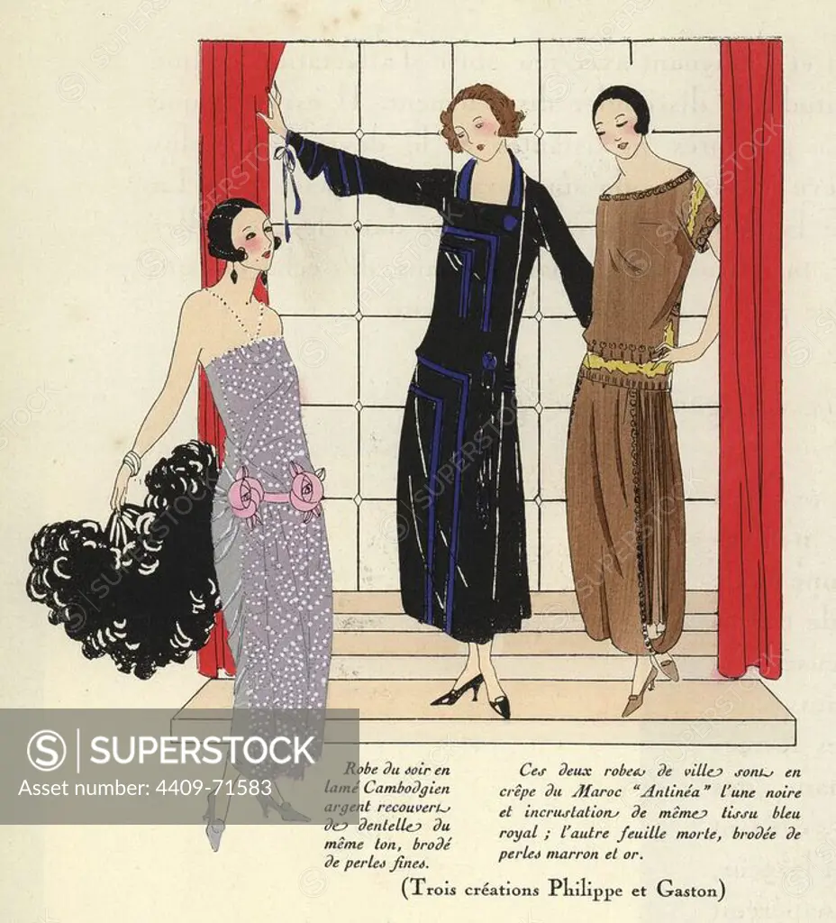 Woman in silver Cambodian lame evening dress covered with lace and pearls, and two women in town dresses of black Moroccan crepe and "dead leaf" brown Moroccan crepe. Handcolored pochoir (stencil) lithograph from the French luxury fashion magazine "Art, Gout, Beaute" 1923.