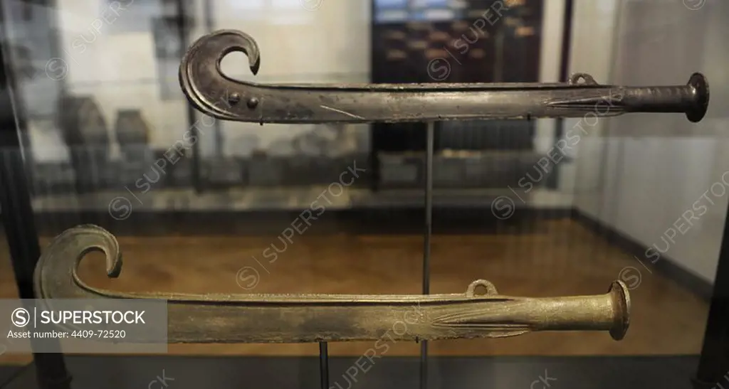 Curved swords sacrificed in a bog. C. 1550 BC. Bronze Age. Made in Scandinavia. From Rorby, western Zealand. National Museum of Denmark. Copenhagen. Denmark.