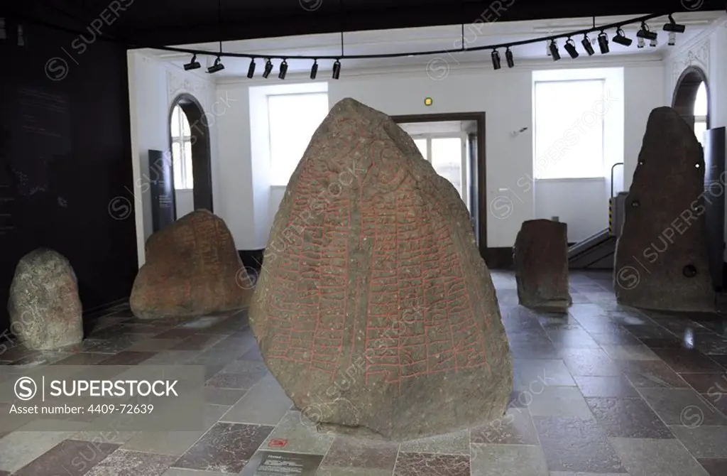 Art. Germanic. Viking Age. Northern Europe. Runestone. Dedicated to their ancestors. Tirsted. 10th century AD. "Asrad and Hildvig raised this stone in memory of Frede". National Museum of Denmark.