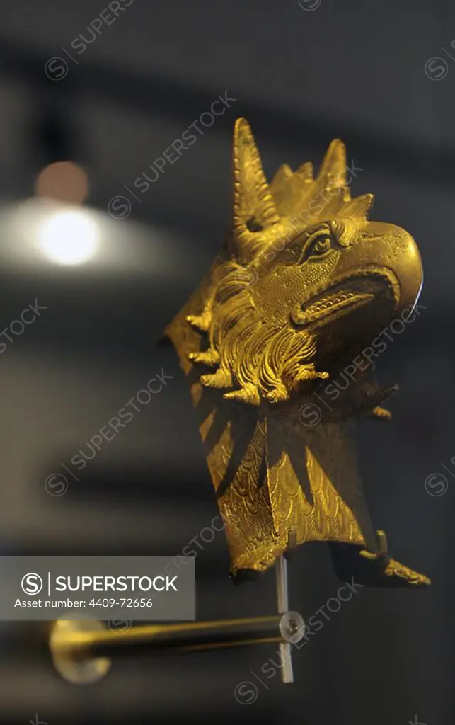 The early Iron. Roman influence. Gryphon of Vimose. A gryphon's head of gilt bronze. The gryphon was perhaps once part of a Roman parade helmet. Was found in a Bog, Funen. National Museum of Denmark.