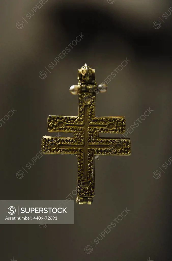 The Roskilde cross. Byzantine reliquary cross of gold. The front side is decorated with 7 pearls and 15 gems. Around 1100. Found in the rood arch crucifix of Roskilde Cathedral. Denmark. National Museum of Denmark.