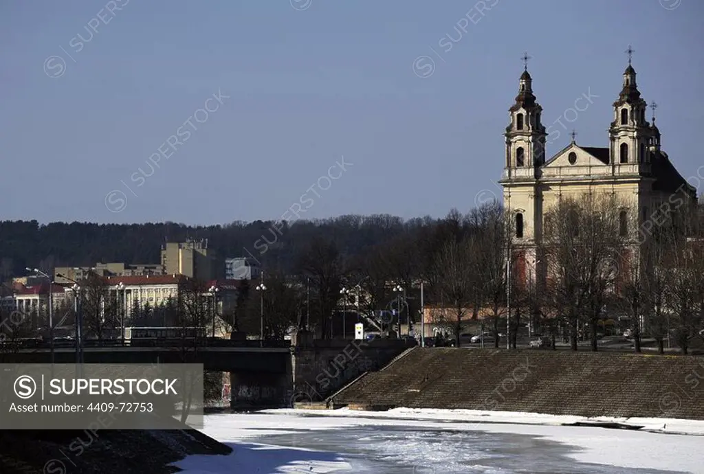 Lithuania. Vilnius. Frozen waters of the Neris river. At background, the Church of Saint Raphael the Archangel. 18th century.