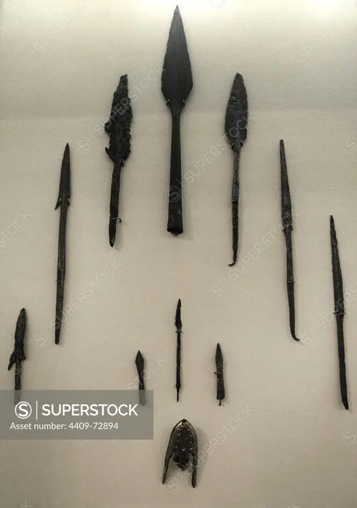 Latvia. 12th-13th centuries. Iron Spearheads and Damascus steel, iron arrowheads, bronze tips and iron ax. Museum of History and Navigation. Riga. Latvia.