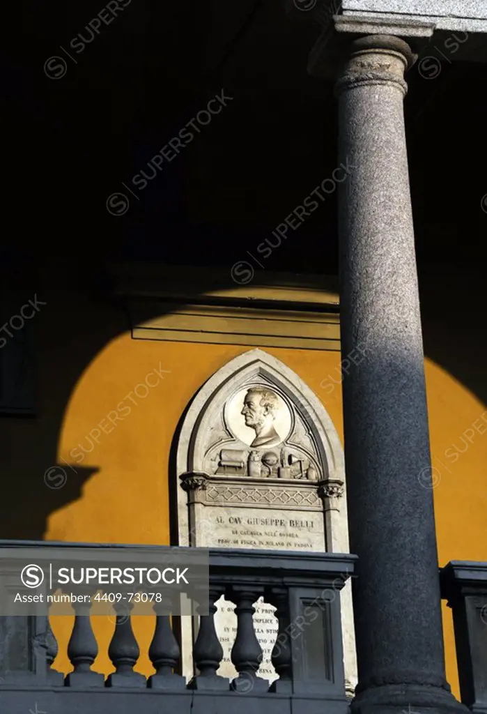 Headstone of Giuseppe Belli (1791-1860). Italian physicist and mathematician. Carrara marble. Relief depicting a portrait of Belli inside a medallion with some instruments relating to physics. University of Pavia. Italy.