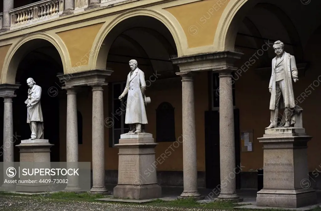 Italy. Pavia. Courtyard in University of Pavia. From left to right, statues: Luigi Porta Pavese (1800-1875), Antonio Maria Bordoni (1789-1860) and Bartolomeo Panizza (1785-1667).