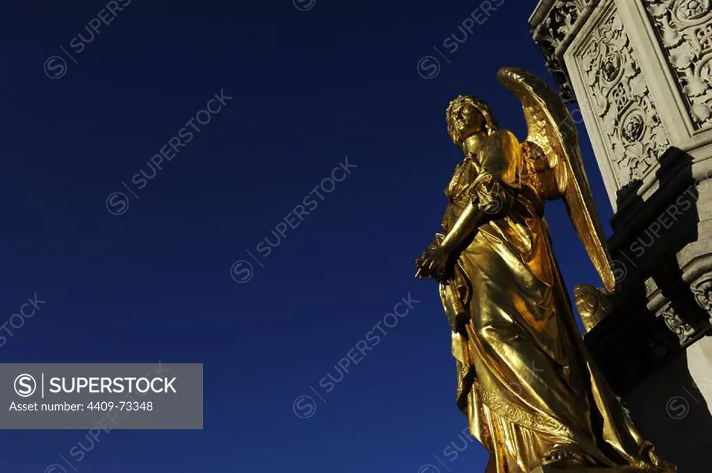 Croatia. Zagreb. Holy Mary's column with angels and fountain by the German-Austrian sculptor Anton Dominik Fernkorn (1813-1878) in 1865. The fountain was built by the Austrian architect Hermann Bolle (1845-1926) between 1880-1882. One of the four golden angels located on the pedestal. Kaptol Square.