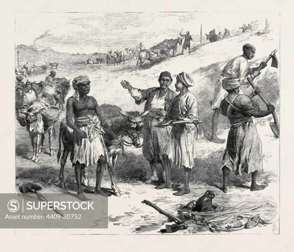 THE ISTHMUS OF SUEZ MARITIME CANAL: LABOURERS REMOVING EARTH, 1869.