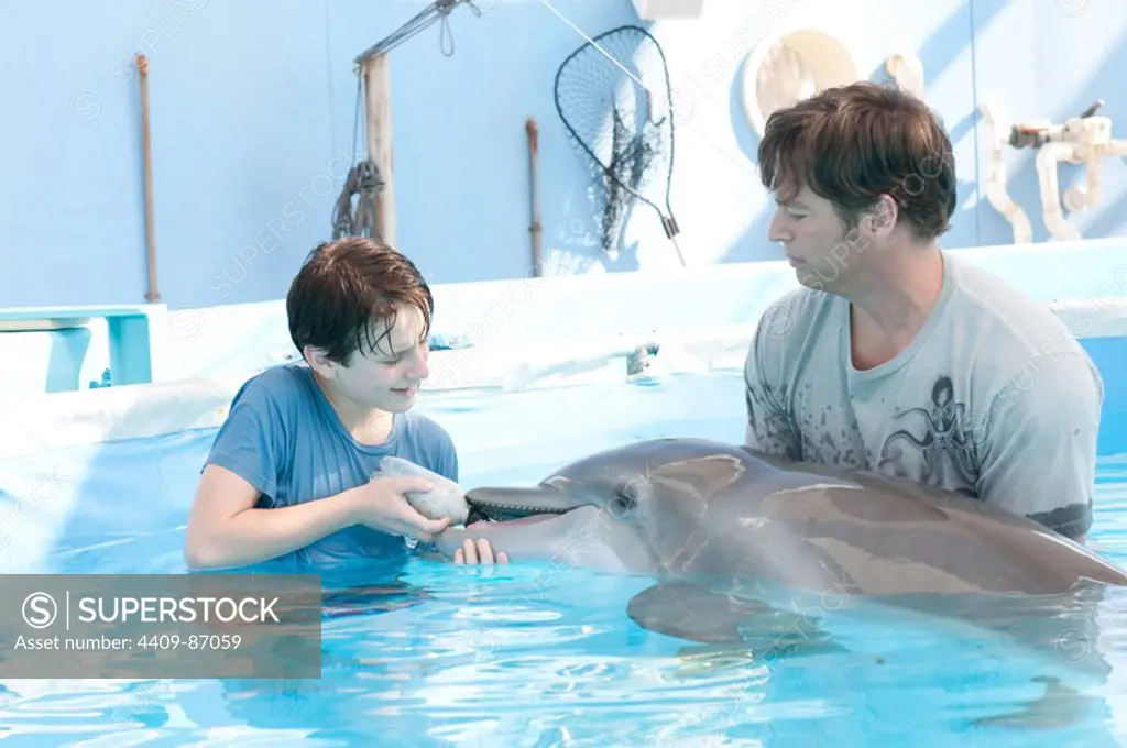 HARRY CONNICK JR. and NATHAN GAMBLE in DOLPHIN TALE (2011), directed by CHARLES MARTIN SMITH.