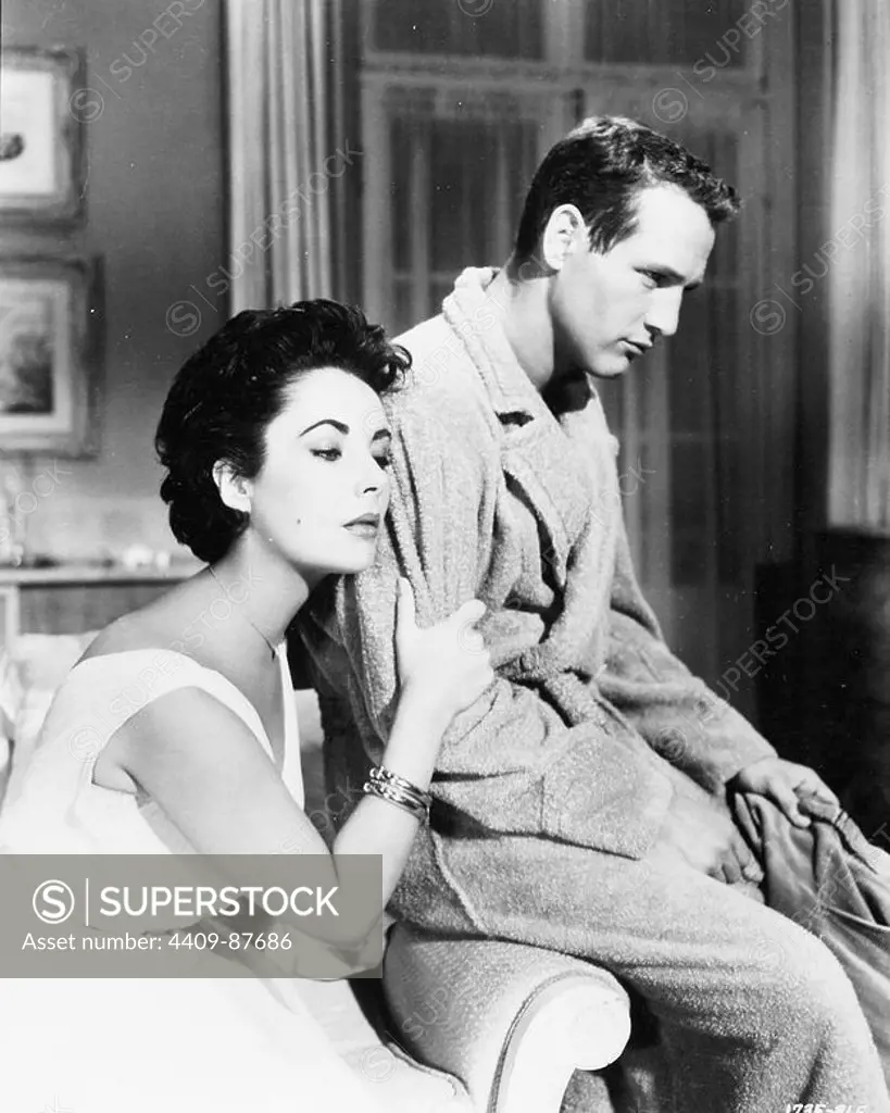 PAUL NEWMAN and ELIZABETH TAYLOR in CAT ON A HOT TIN ROOF (1958), directed by RICHARD BROOKS.