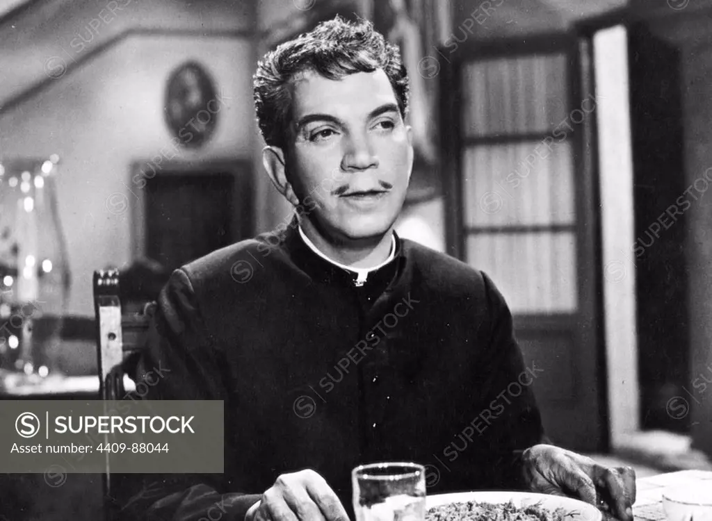 CANTINFLAS in THE LITTLE PRIEST (1964) -Original title: EL PADRECITO-, directed by MIGUEL M. DELGADO.