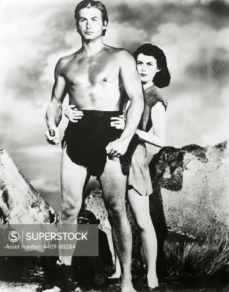 LEX BARKER and VANESSA BROWN in TARZAN AND THE SLAVE GIRL (1950), directed by LEE SHOLEM.