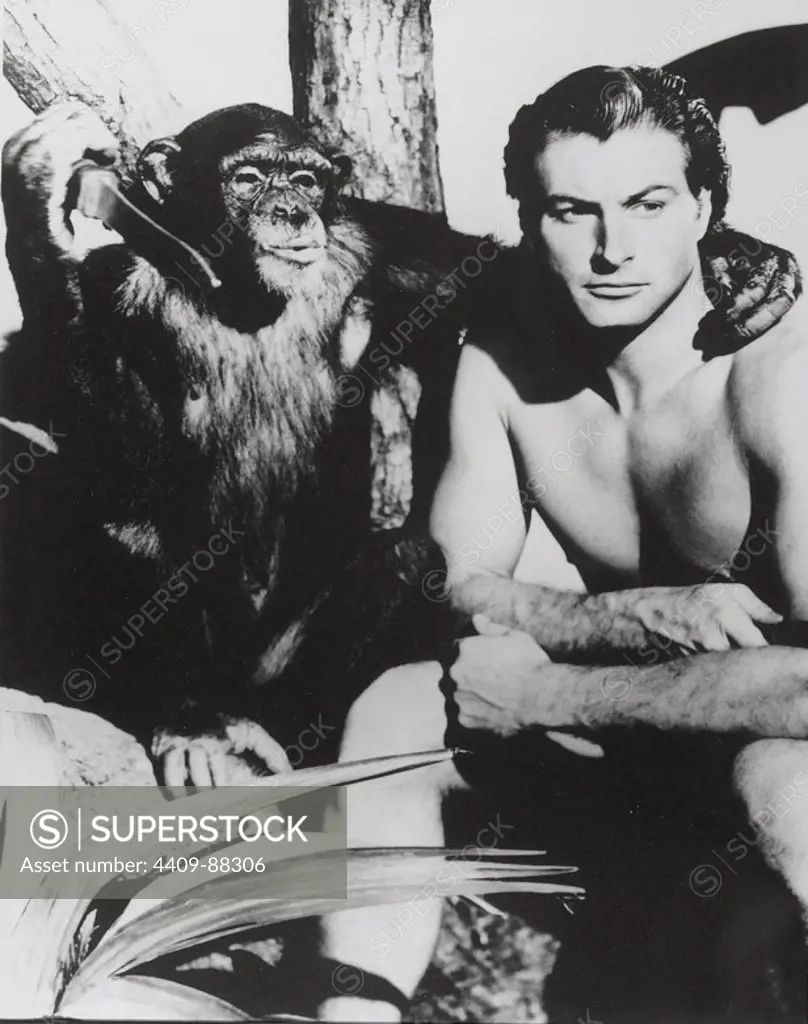 LEX BARKER in TARZAN'S SAVAGE FURY (1952), directed by CY ENDFIELD.