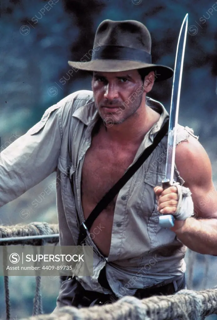 HARRISON FORD in INDIANA JONES AND THE TEMPLE OF DOOM (1984), directed by STEVEN SPIELBERG.