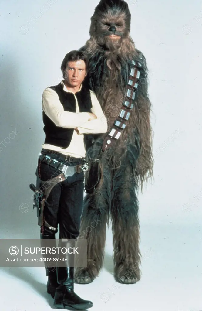 HARRISON FORD and PETER MAYHEW in STAR WARS: EPISODE IV-A NEW HOPE (1977), directed by GEORGE LUCAS.