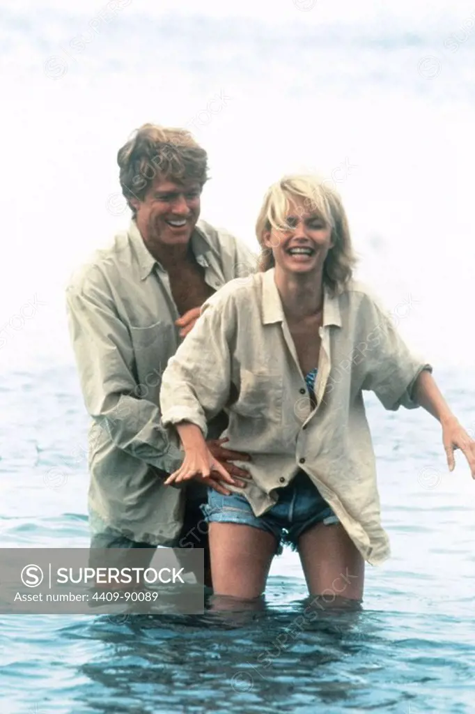 MICHELLE PFEIFFER and ROBERT REDFORD in UP CLOSE & PERSONAL (1996), directed by JONATHAN MICHAEL AVNET.