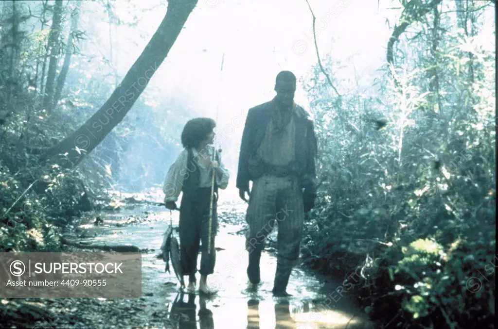 ELIJAH WOOD in THE ADVENTURES OF HUCK FINN (1993), directed by STEPHEN SOMMERS.