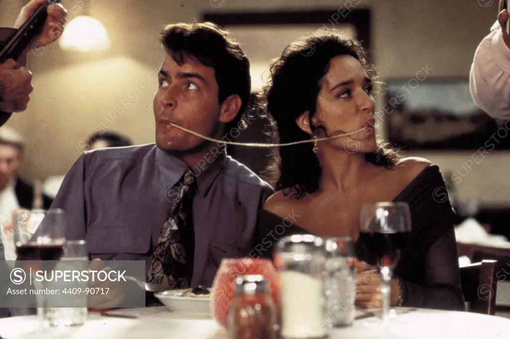 VALERIA GOLINO and CHARLIE SHEEN in HOT SHOTS! PART DEUX (1993), directed by JIM ABRAHAMS.