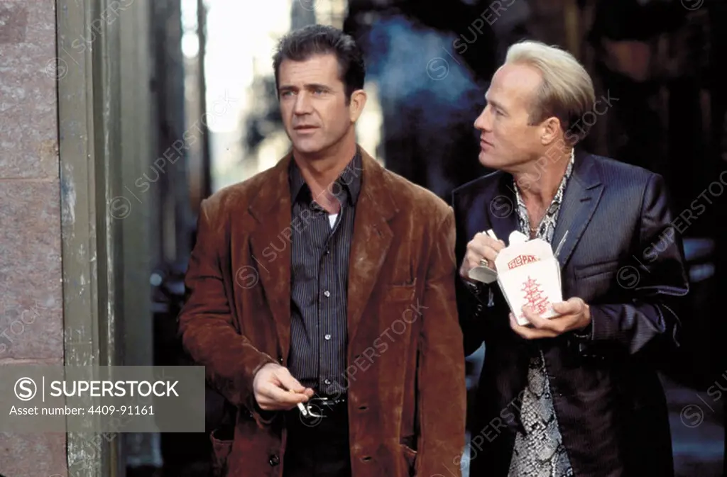 MEL GIBSON and GREGG HENRY in PAYBACK (1999), directed by BRIAN HELGELAND.