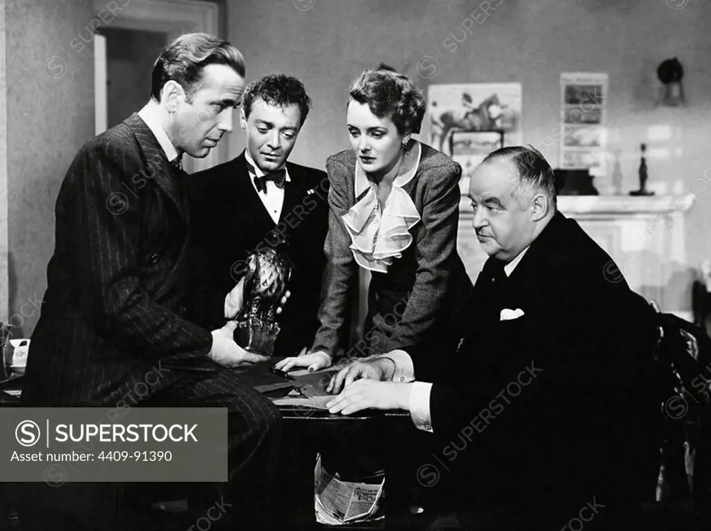 PETER LORRE, HUMPHREY BOGART, MARY ASTOR and SYDNEY GREENSTREET in THE MALTESE FALCON (1941), directed by JOHN HUSTON.