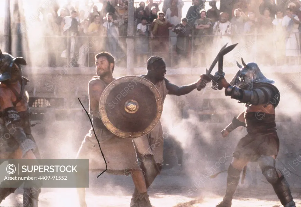 DJIMON HOUNSOU and RUSSELL CROWE in GLADIATOR (2000), directed by RIDLEY SCOTT.