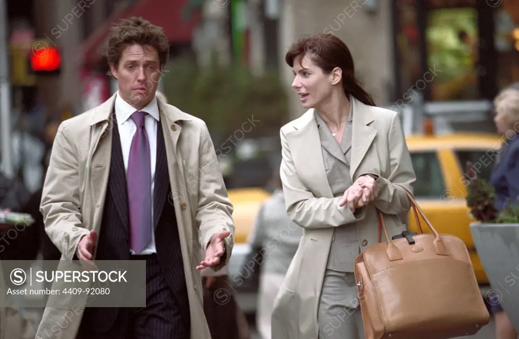 HUGH GRANT and SANDRA BULLOCK in TWO WEEKS NOTICE (2002), directed by MARC LAWRENCE.