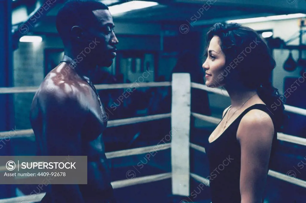 JENNIFER LOPEZ and WESLEY SNIPES in MONEY TRAIN (1995), directed by JOSEPH RUBEN.