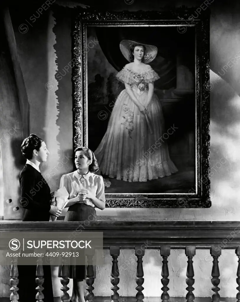 JOAN FONTAINE and JUDITH ANDERSON in REBECCA (1940), directed by ALFRED HITCHCOCK.