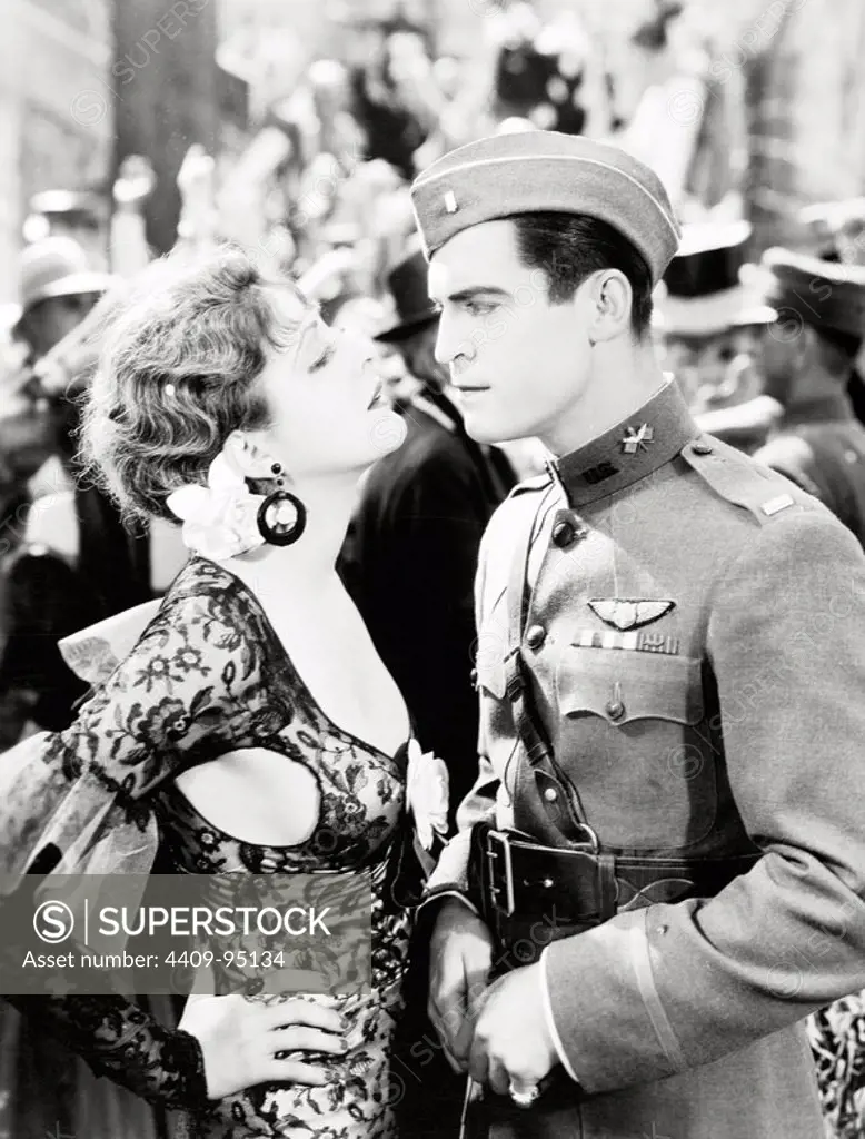 BILLIE DOVE and CHESTER MORRIS in COCK OF THE AIR (1932), directed by TOM BUCKINGHAM.