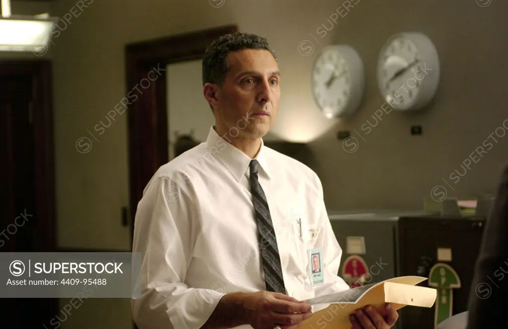 JOHN TURTURRO in THE GOOD SHEPHERD (2006), directed by ROBERT DE NIRO. Copyright: Editorial use only. No merchandising or book covers. This is a publicly distributed handout. Access rights only, no license of copyright provided. Only to be reproduced in conjunction with promotion of this film.
