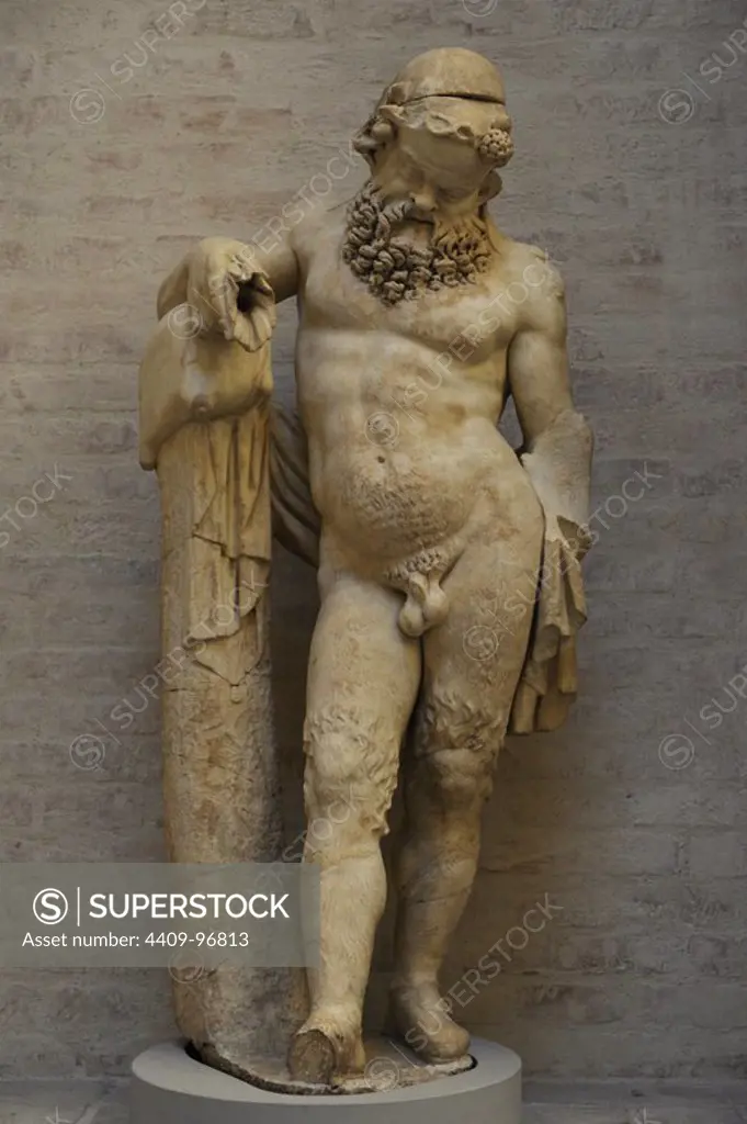 Greek art. Niche. Statue of a Silenus (old satyr). Roman sculpture after a model of about 330 BC. Glyptothek. Munich. Germany. Europe..