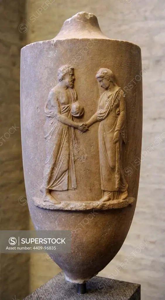 Greek Art. Munich Lekythos. Grave monument in the form of an oil flask (lekythos). About 370 BC. As a sing of their attachment the couple reach out their hands to each other. Gyptothek. Munich. Germany.