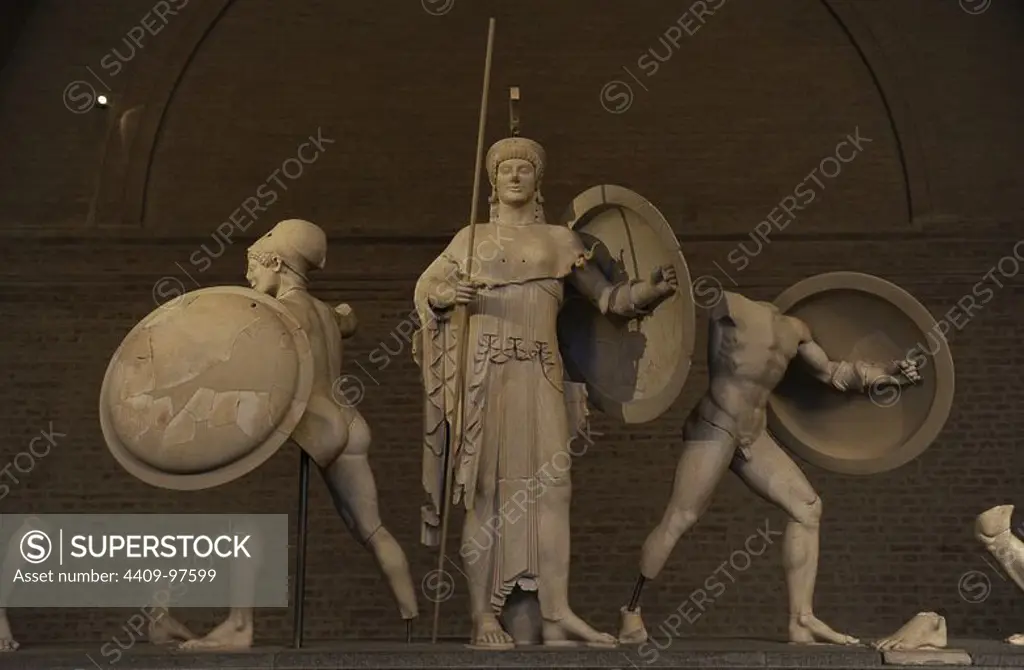 Aegina West Pediment. 500-490 BC. Gods in battle before Troy, in the presence of the goddess Athena. Detail of Athena, Ajax (right) and a trojan warrior. Late Archaic. Marble. From Sanctuary of Aphaia, Aegina Island, Greece.