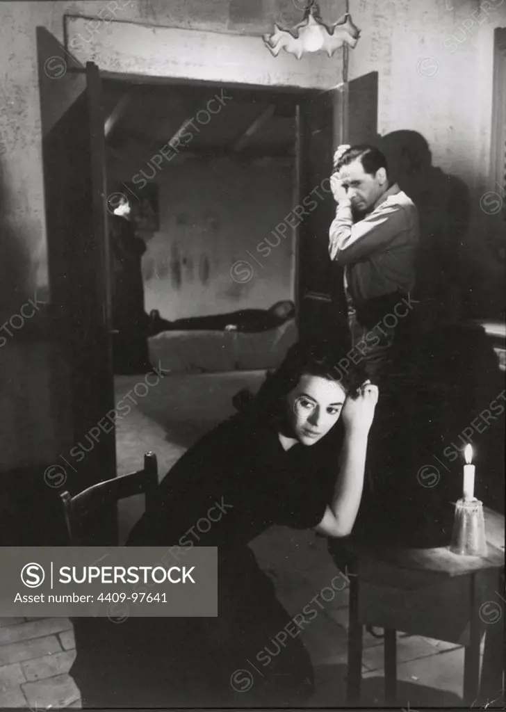 GIOVANNA RALLI and LEO GENN in ESCAPE BY NIGHT (1960) -Original title: ERA NOTTE A ROMA-, directed by ROBERTO ROSSELLINI.