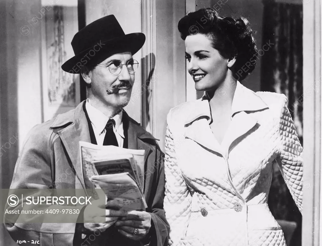 GROUCHO MARX and JANE RUSSELL in DOUBLE DYNAMITE (1951), directed by IRVING CUMMINGS.