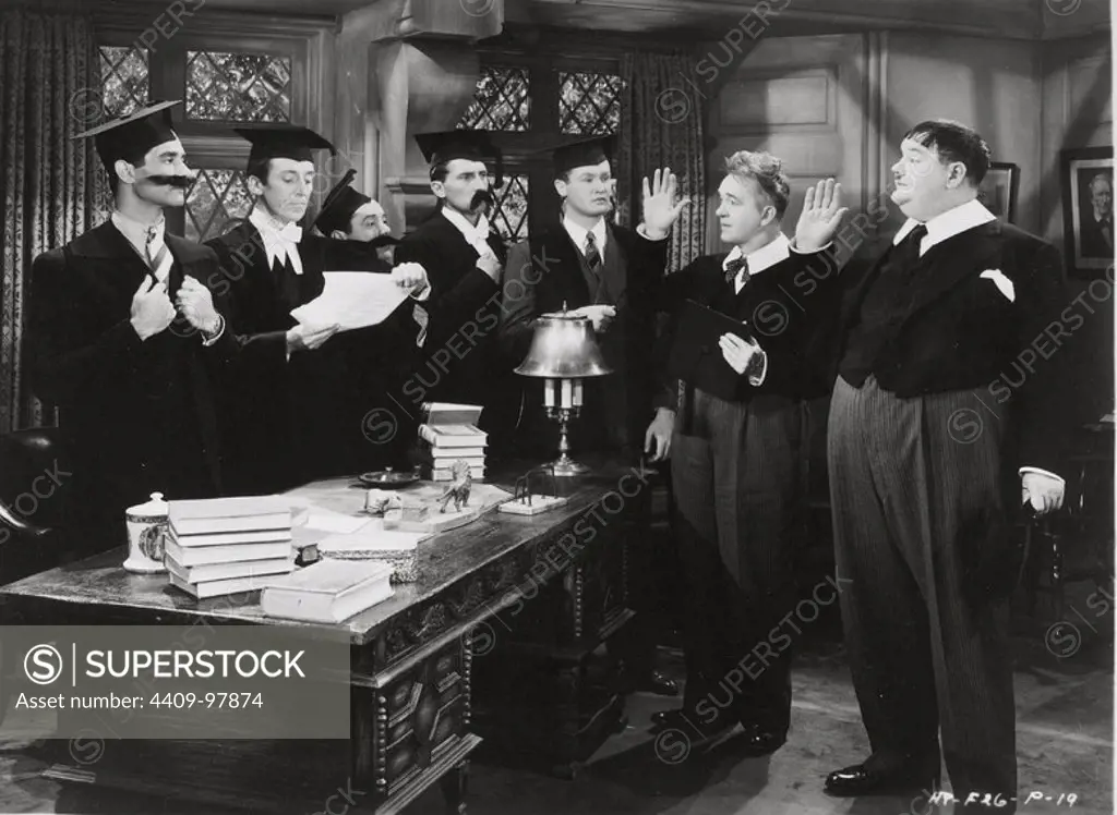 OLIVER HARDY, STAN LAUREL and PETER CUSHING in A CHUMP AT OXFORD (1940), directed by ALF GOULDING.