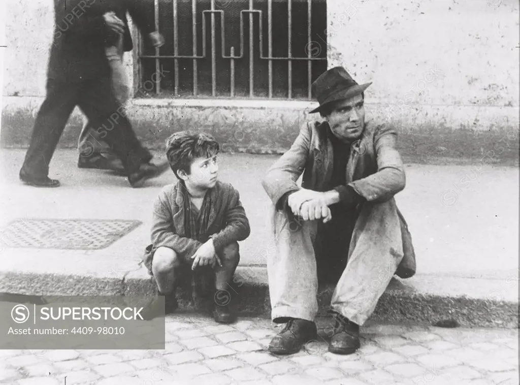 LAMBERTO MAGIORANI and ENZO STAIOLA in BICYCLE THIEF (1948) -Original title: LADRI DI BICICLETTE-, directed by VITTORIO DE SICA.