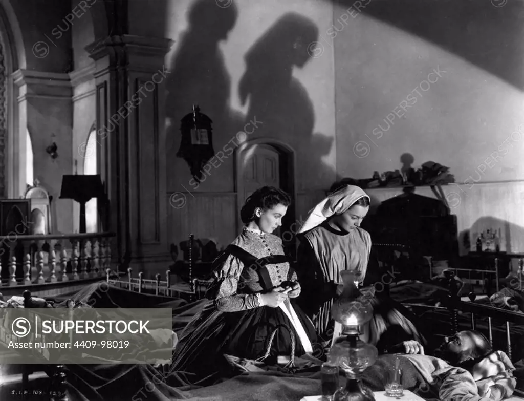 OLIVIA DE HAVILLAND and VIVIEN LEIGH in GONE WITH THE WIND (1939), directed by GEORGE CUKOR and VICTOR FLEMING.