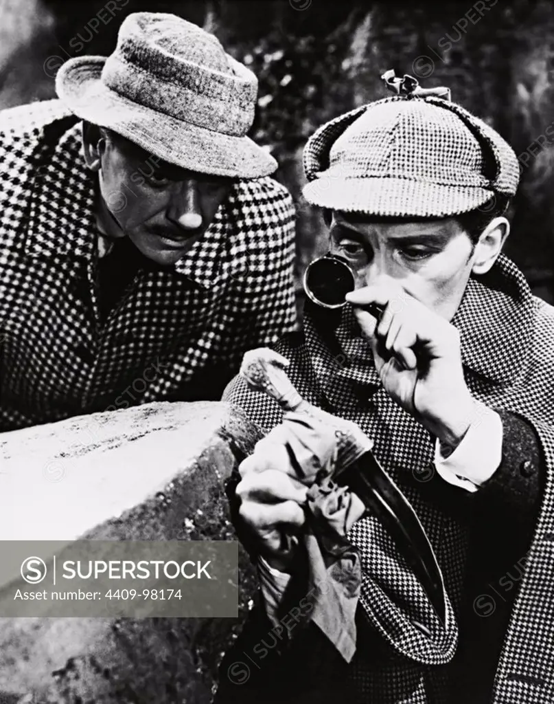 PETER CUSHING and ANDRE MORELL in THE HOUND OF THE BASKERVILLES (1959), directed by TERENCE FISHER.