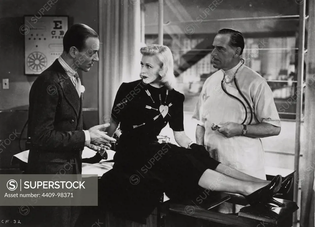 GINGER ROGERS, FRED ASTAIRE and WALTER KINGSFORD in CAREFREE (1938), directed by MARK SANDRICH.