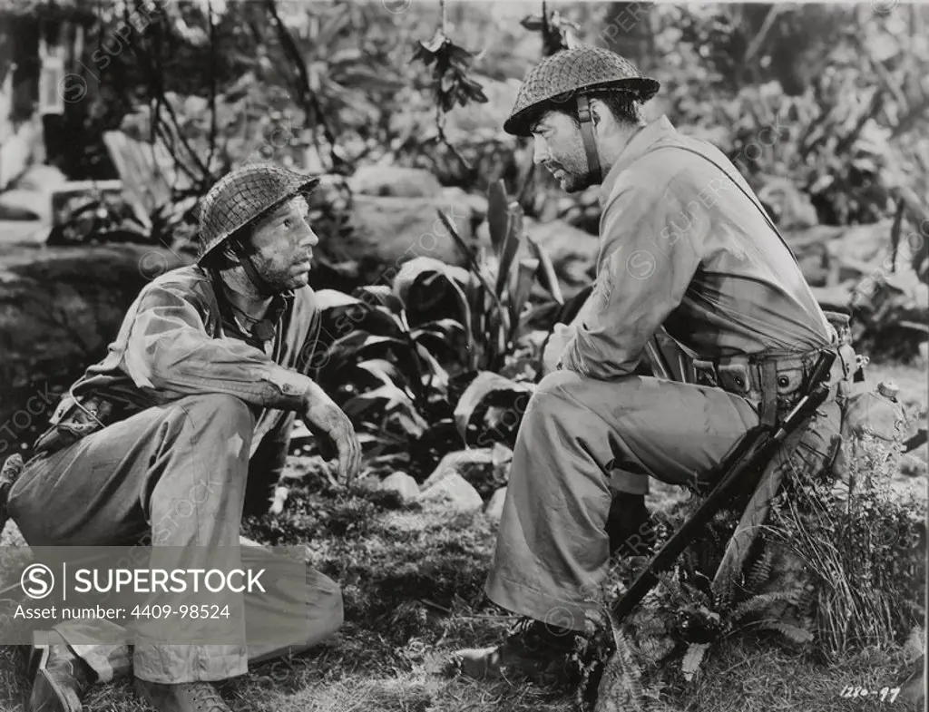 ROBERT TAYLOR and GEORGE MURPHY in BATAAN (1943), directed by TAY GARNETT.
