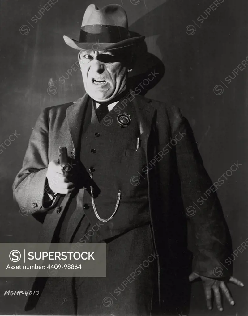 LON CHANEY in WHILE THE CITY SLEEPS (1956), directed by JACK CONWAY.