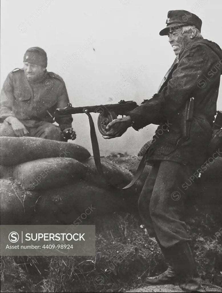 JAMES COBURN and KLAUS LOWITSCH in CROSS OF IRON (1977), directed by SAM PECKINPAH.