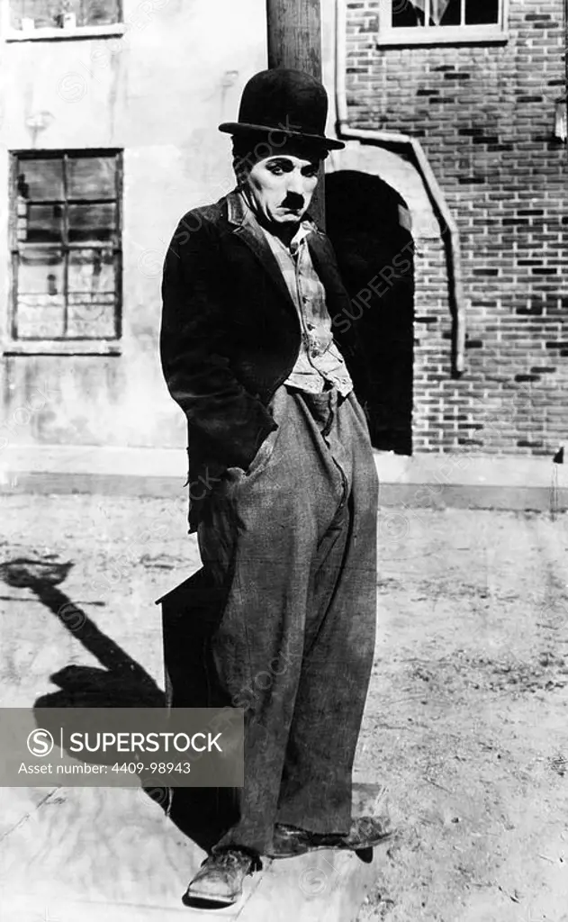 CHARLIE CHAPLIN in A DOG'S LIFE (1918), directed by CHARLIE CHAPLIN.